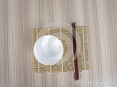 Chopsticks And Porcelain Bowl Stock Photo
