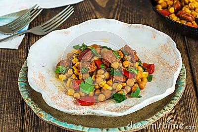 Chorizo and chickpeas braised in cider Stock Photo