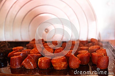 chorizo Frito a la barbacoa, barbecue meat with chorizo in a family house outdoors Stock Photo