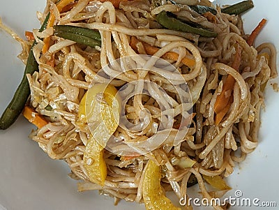 chow mien spicy noodles with healthy stir fried pepper beans carrots Stock Photo