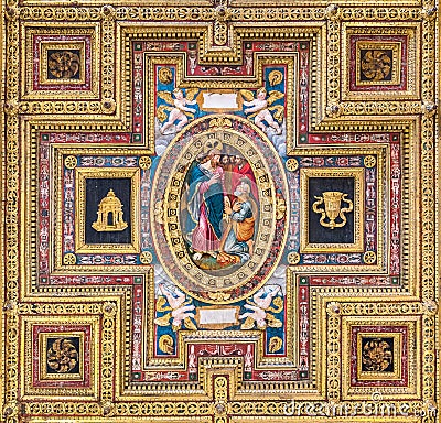 `Christ Handing the Keys to Saint Peter` wooden panel in the ceiling of the Church of San Silvestro al Quirinale in Rome, Italy. Stock Photo