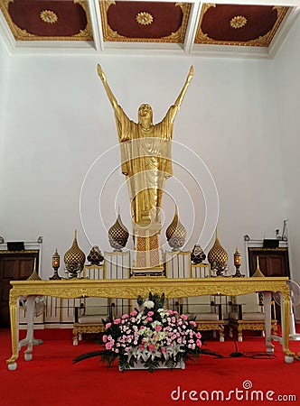 Christ the Redeemer , Golden Jesus statue Editorial Stock Photo