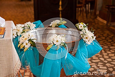 Christening font in an orthodox church Stock Photo