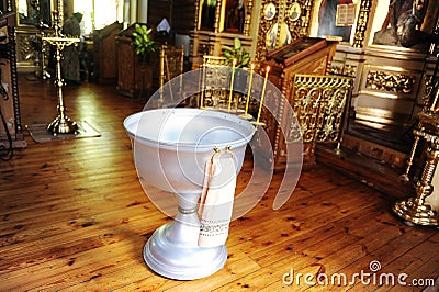 Christening font in the Russian Orthodox Church Stock Photo