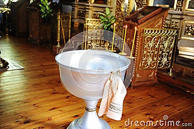 Christening font in the Russian Orthodox Church Stock Photo