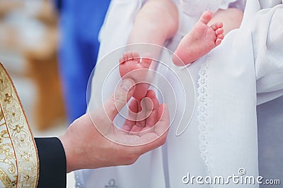 Christening newborn in church. Stock Photo