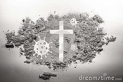 Christian cross and covid-19, coronavirus virus bacteria microbe germ made in ash, dirt, dust as religion Stock Photo