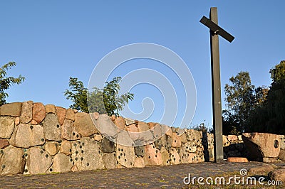 Christian cross high monument in the cemetery stairs Stock Photo