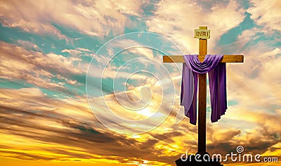 Christian cross over bright sunset background Stock Photo