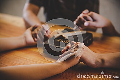 Christian family worship God in home Stock Photo