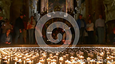 Christian People Taking all Lighted Lights Stock Photo