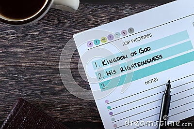 Christian top priorities list, seek first kingdom of God and His righteousness, handwritten text in notebook Stock Photo