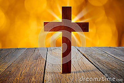Christian wood cross on blur flare lights Stock Photo