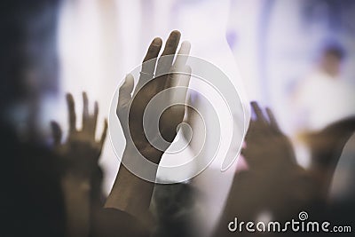 Christian Worship with Raised Hand Joyful in the Glory and Love Stock Photo