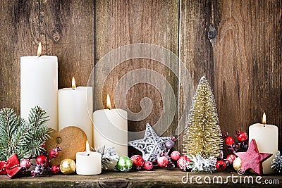 Christmas Advent candles with festive decor Stock Photo