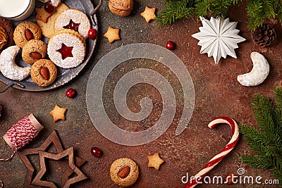 Christmas background with blank space for text, variety of Christmas cookies, milk and xmas decorations Stock Photo