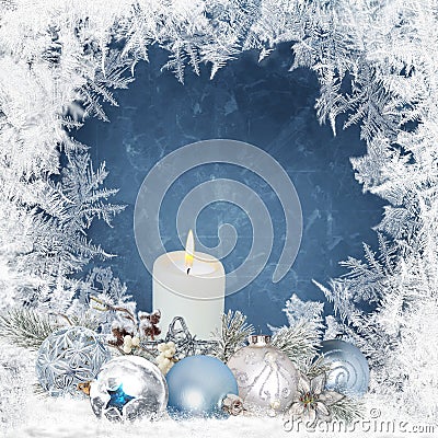 Christmas background with candles, pine branches, balls on a blue background with a frosty pattern Stock Photo