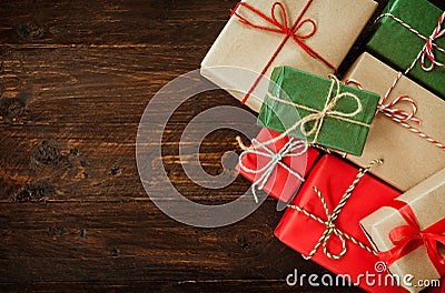 Christmas background with decorations and handmade gift boxes on old wooden Stock Photo