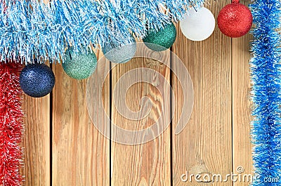 Christmas background with decorations on wooden board with copy space for text. New year theme for postcards. Wooden background Stock Photo