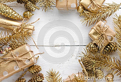 Christmas background with festive golden ornament on white wooden background. Greeting card. Stock Photo