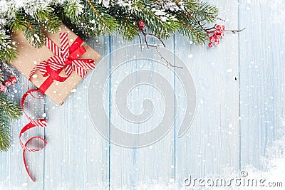 Christmas background with fir tree and gift box Stock Photo