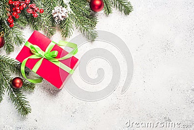 Christmas background with fir tree, present box and decorations Stock Photo