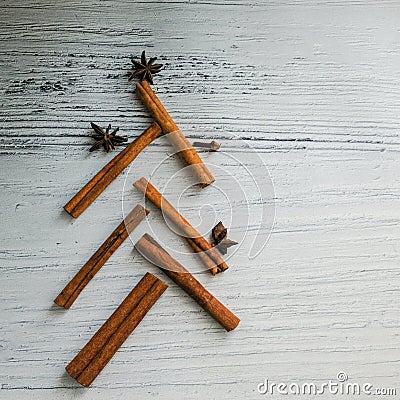 Christmas background food - an unusual Christmas tree made of cinnamon on wooden table. Top view, copy space Stock Photo