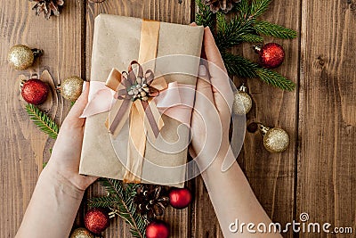 Christmas background with gift boxes, paper`s rools and decorations on red. Preparation for holidays. Top view with copy space. Stock Photo