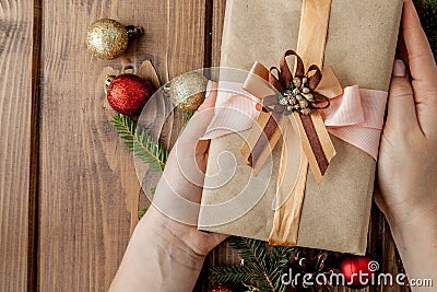 Christmas background with gift boxes, paper`s rools and decorations on red. Preparation for holidays. Top view with copy space. Stock Photo