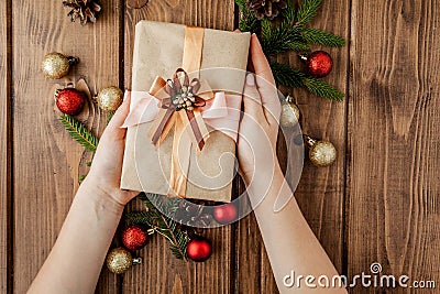 Christmas background with gift boxes, paper`s rools and decorations on red. Preparation for holidays. Top view with copy space. Stock Photo