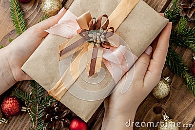 Christmas background with gift boxes, paper`s rools and decorations on red. Preparation for holidays. Top view with copy space. Stock Photo