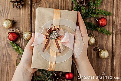 Christmas background with gift boxes, paper`s rools and decorations on red. Preparation for holidays. Top view with copy space. Stock Photo