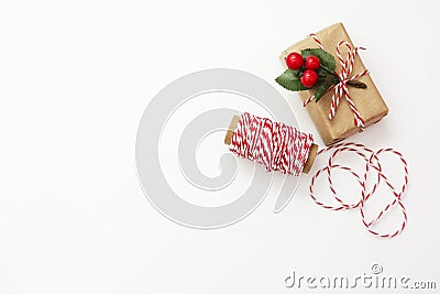 Christmas background. Gift boxes wraped in craft paper over white background. Wraping gift boxes. Top view. Copy space Stock Photo