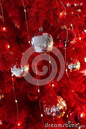 Red Christmas background with red and silver bouble ornaments Stock Photo