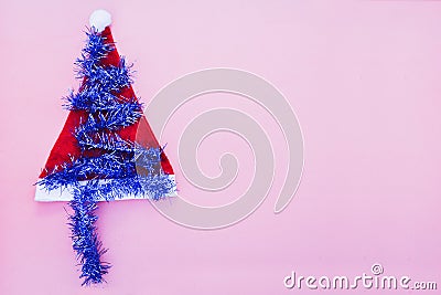 Christmas background with red hat, ribbon tree decorati Stock Photo