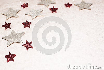 Christmas background, with red and silver glitter stars and snow Stock Photo
