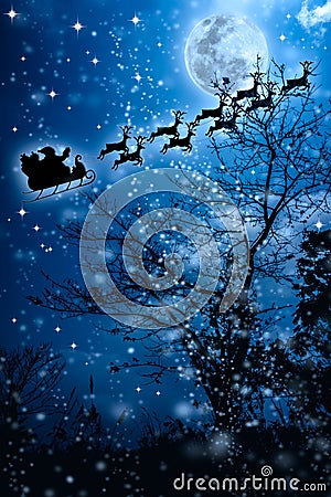 Christmas background. Silhouette of Santa Claus flying on a sleigh pulled by reindeer. Stock Photo