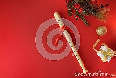 Christmas background of traditional plastic recorder top view Stock Photo