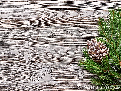 Christmas background of twigs, cedar cones on the old Board Stock Photo