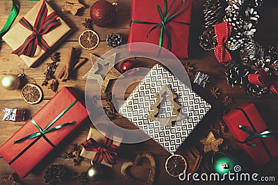 christmas background - wrapped gifts and decorations on wooden table Stock Photo