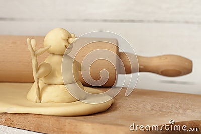 Christmas baking concept with dough snowman Stock Photo