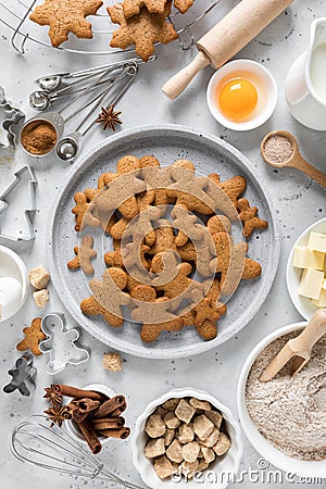 Christmas baking culinary background. Xmas gingerbread on kitchen table and ingredients for cooking festive cookies Stock Photo