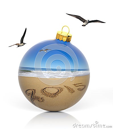 Christmas ball with 2015 written on beach Stock Photo