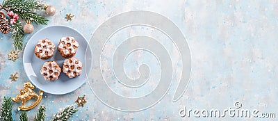 Christmas banner background, festive baked goods on light blue background with copy space Stock Photo