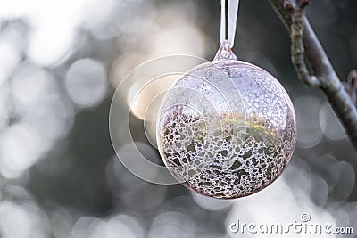 Christmas bauble hanging outside Stock Photo
