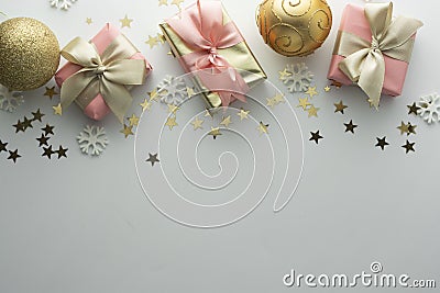 Christmas, baubles golden gift boxes party, birthday background. Celebrate shinny surprise copy space. Creative flat lay top view Stock Photo