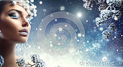 Christmas beauty girl. Winter makeup with gems on lips Stock Photo