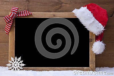 Christmas Blackboard, Santa Hat, Red Loop, Copy Space, Snow Stock Photo