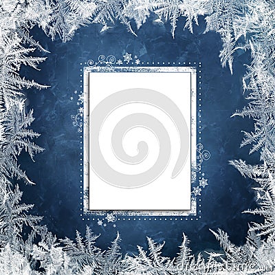 Christmas blue background with frosty patterns and card for text or photo Stock Photo