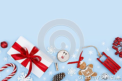 Christmas blue frosty background with gift box, decor and cookies Stock Photo